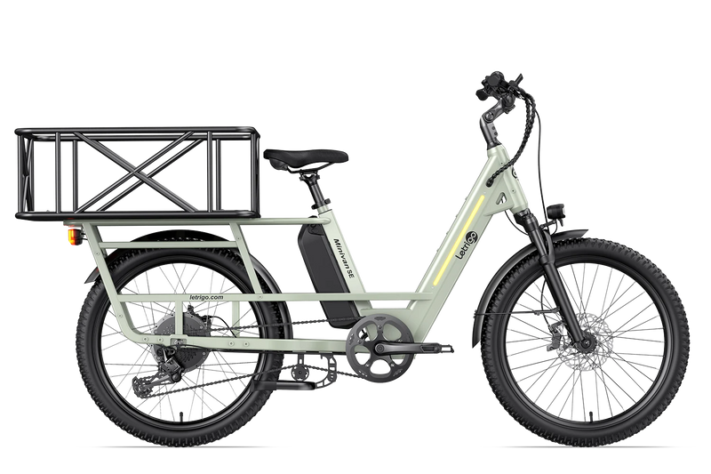 This is a green Letrigo Minivan SE multi-purpose cargo bike with a rear cargo basket